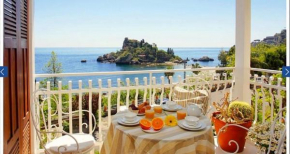 Отель  Orata & Spigola Luxury Apartments - Taormina Holidays  Таормина